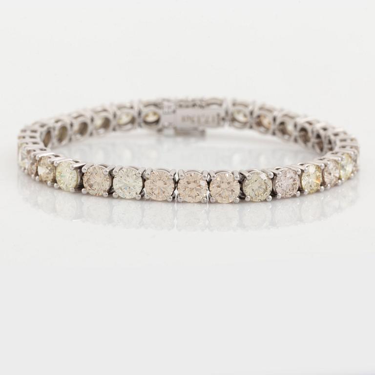 Round brilliant-cut diamond rivière bracelet, with IGI report.