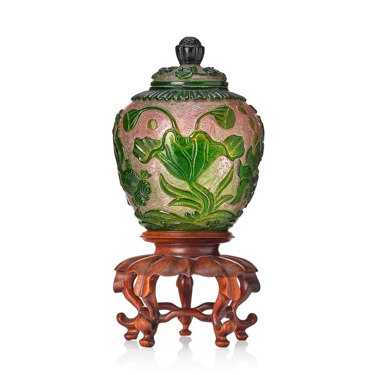 A peking glass jar with cover, Qing dynasty, with Qianlongs four character mark.