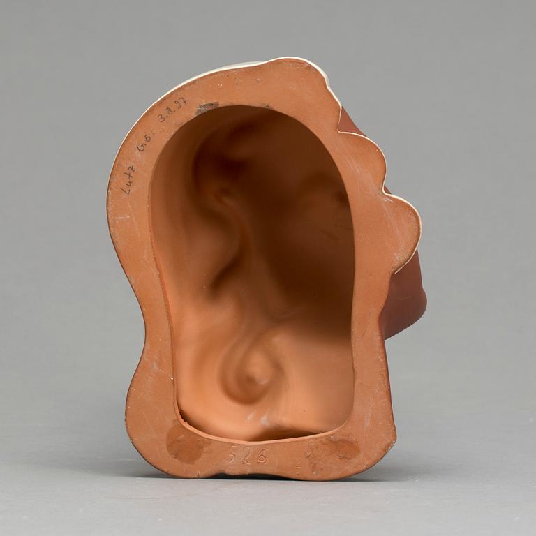 An Adolf Prischl terracotta wall mask for Goldscheider, mid 1900.