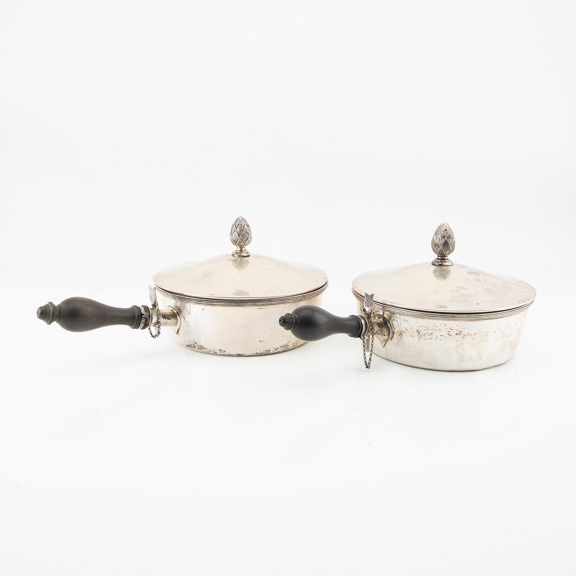A Swedish 20th century set of two silver dishes and cover mark of B Erlandsson Kristianstad 1911 weight 1822 grams.