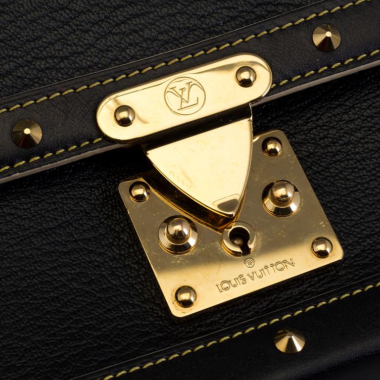 LOUIS VUITTON, a studded leather hand bag.