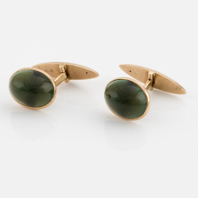 Cufflinks, one pair. 14K gold with cabochon-cut green stone, Russia.