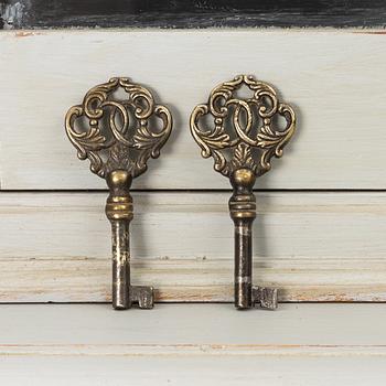A display cabinet, early 20th century.