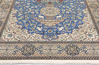 A Figural Nain-Isfahan carpet, part silk, 318 x 213 cm.