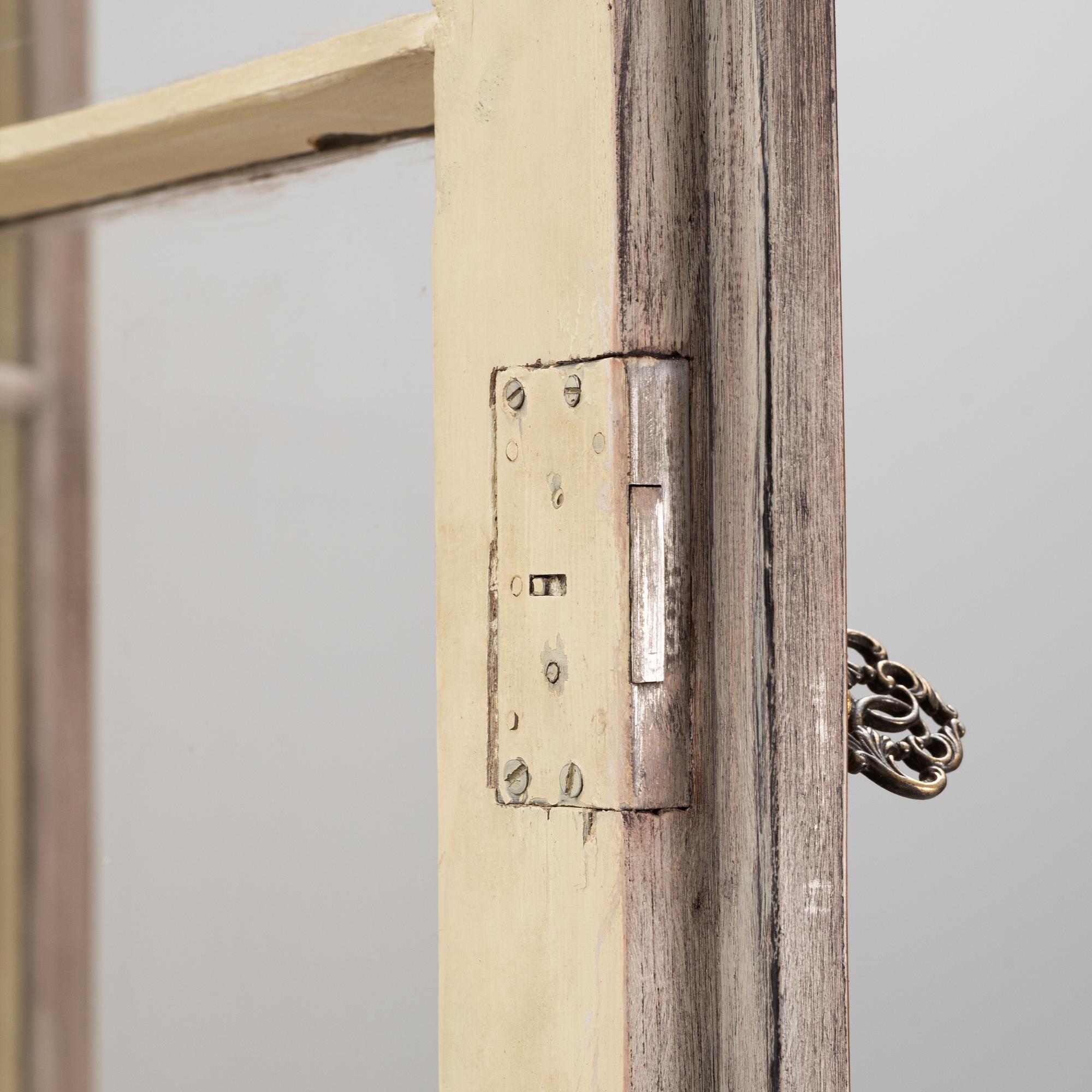 A painted Rococo style cabinet, early 20th Century.