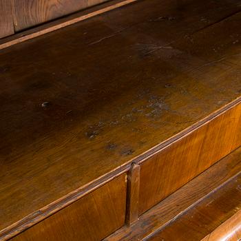 A Swedish walnut-veneered rococo cabinet in the manner of C. Linning, latter half of the 18th Century.