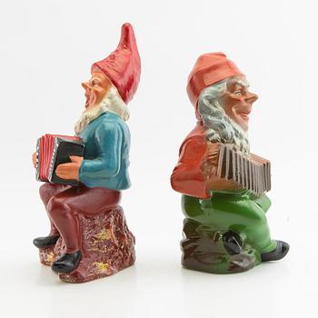 A collection of gnomes 12 pcs mid/late 20th century mostly painted terracotta.