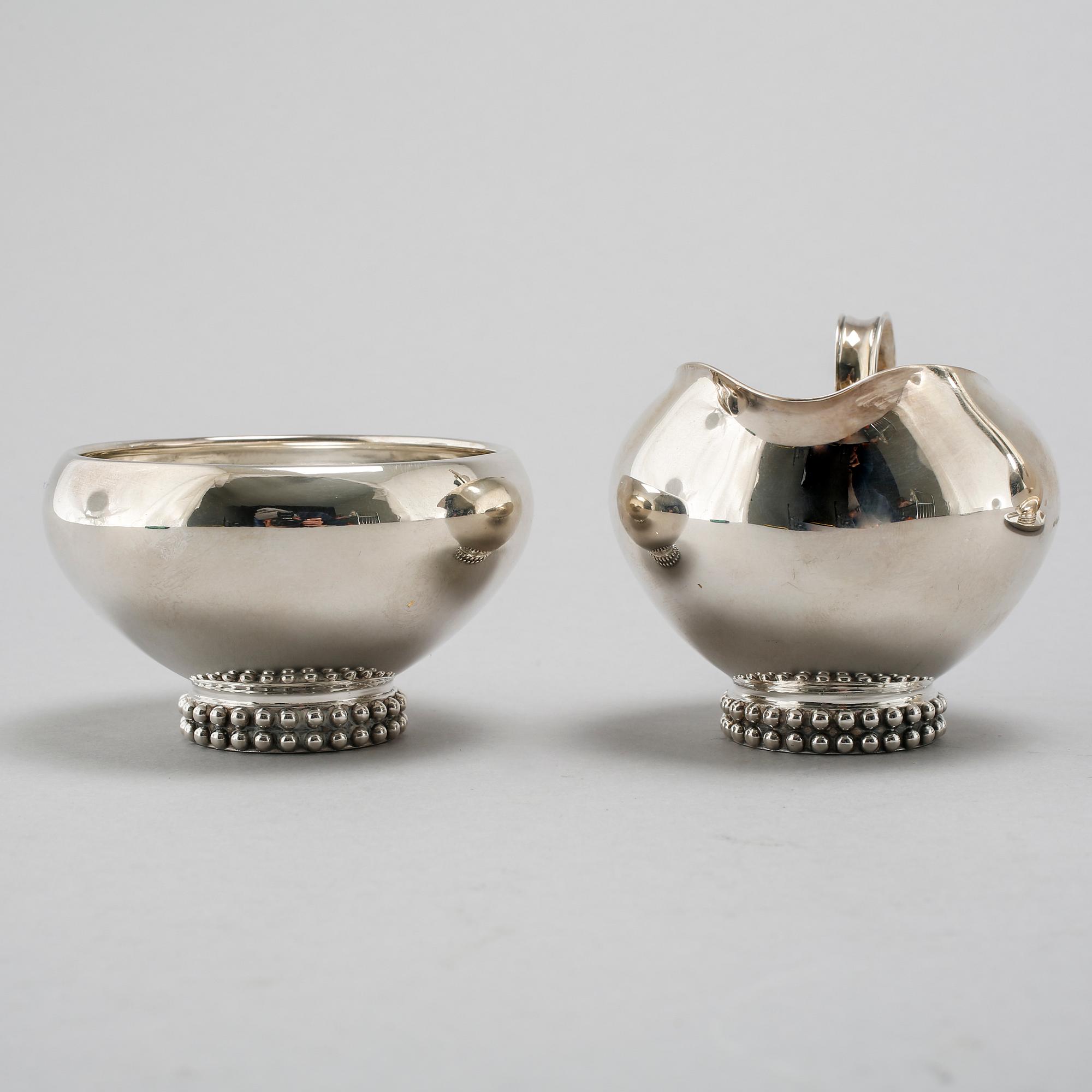 A silver coffee set of four pieces from the middle of the 20th century.