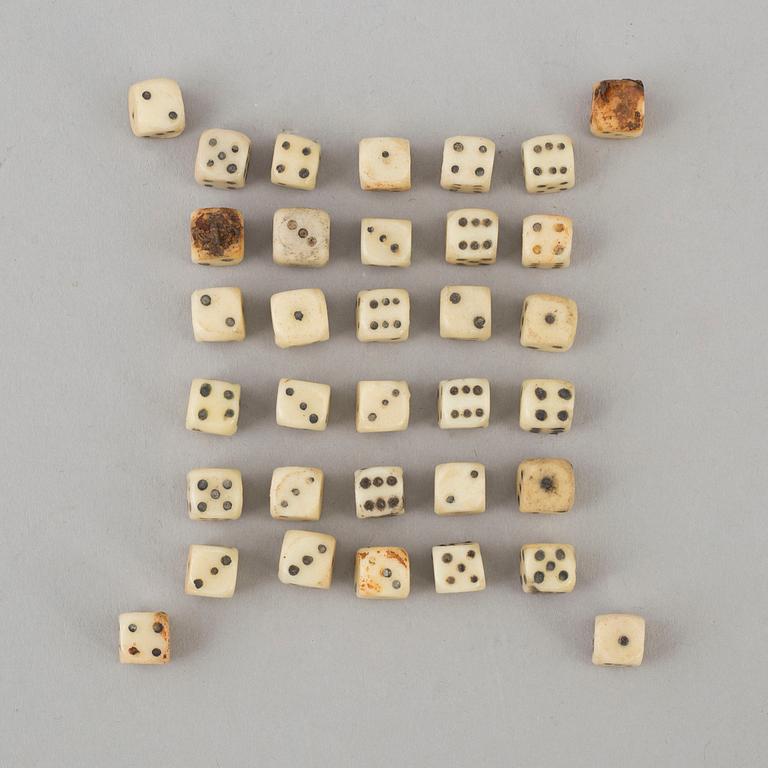 A set of 34 bone dice, 19th century.