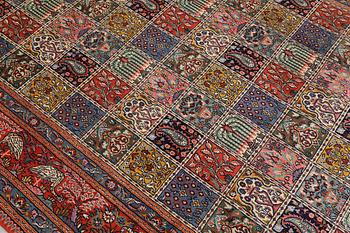 A Moud part silk carpet, 298 x 199 cm.