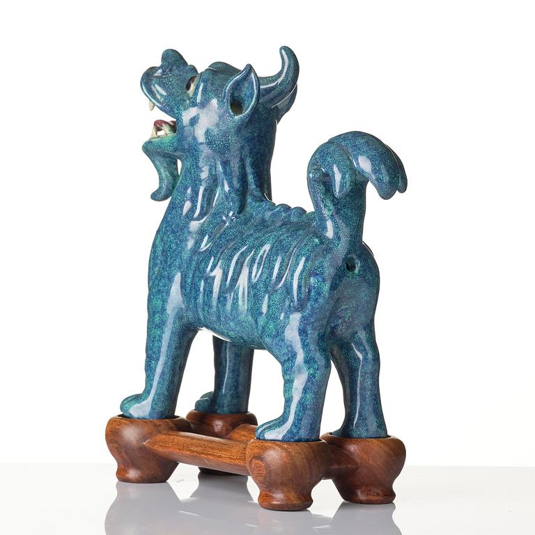 A turquoise/robins egg glazed figure of a buddhist lion, Qing dynasty, Jiaqing (1796-1820).