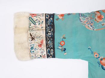 An embroidered silk and fur winter coat, late Qing dynasty (1644-1912).