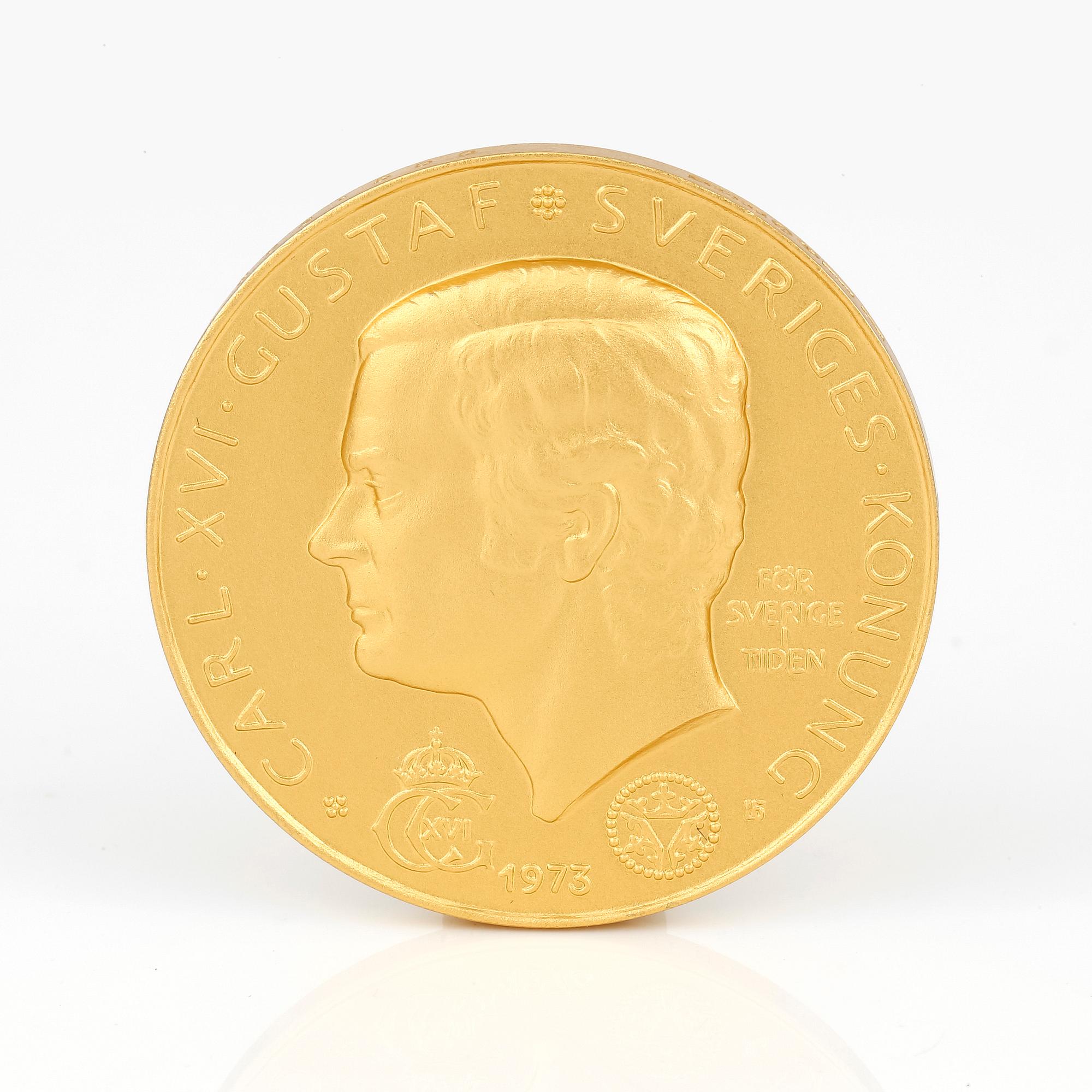 MEDALJ, "Tonskiftesmedaljen", 18 k guld Carl XVI Gustaf, enligt äkthetsintyg nr 388, 1973.