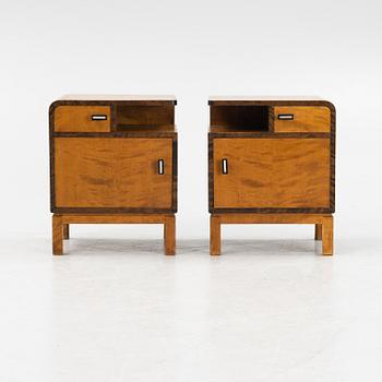 A pair of birch veneered 1930's bedside tables.