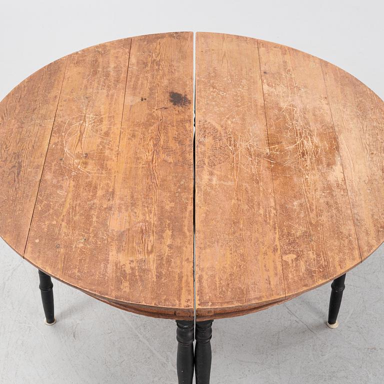 A two-piece dining table, 19th century.