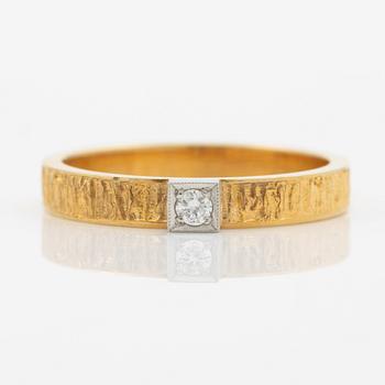 Lapponia, ring, 18K gold set with a round brilliant-cut diamond, Finland 1977.