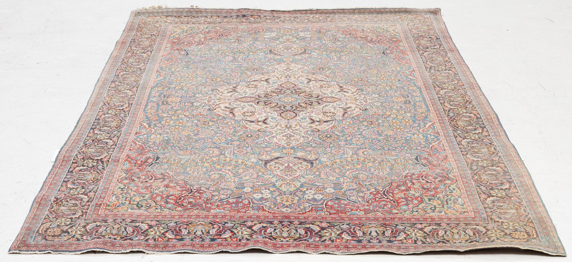 A semi-antique Khorasan rug, east Persia, c. 242 x 140 cm.