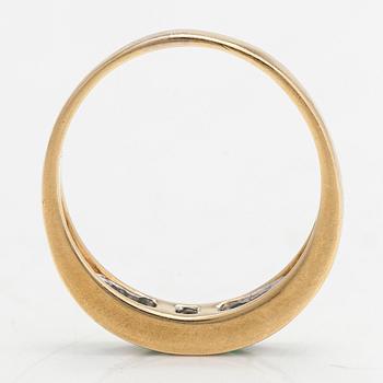 An 18K gold ring, set with emeralds and princess-cut diamonds totalling approx. 0.34 ct. Finnish import hallmarks.