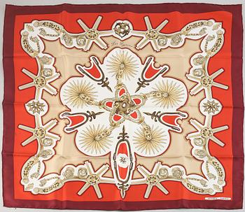 Hermès, a 'Les Eperons' silk scarf.