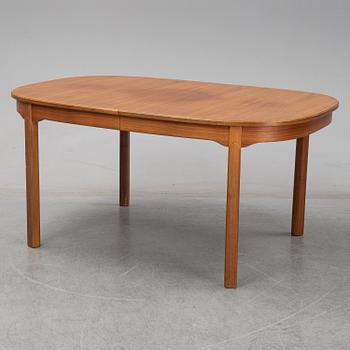 Carl Malmsten, A five-piece walnut 'Ambassadör' dining suite by Carl Malmsten.