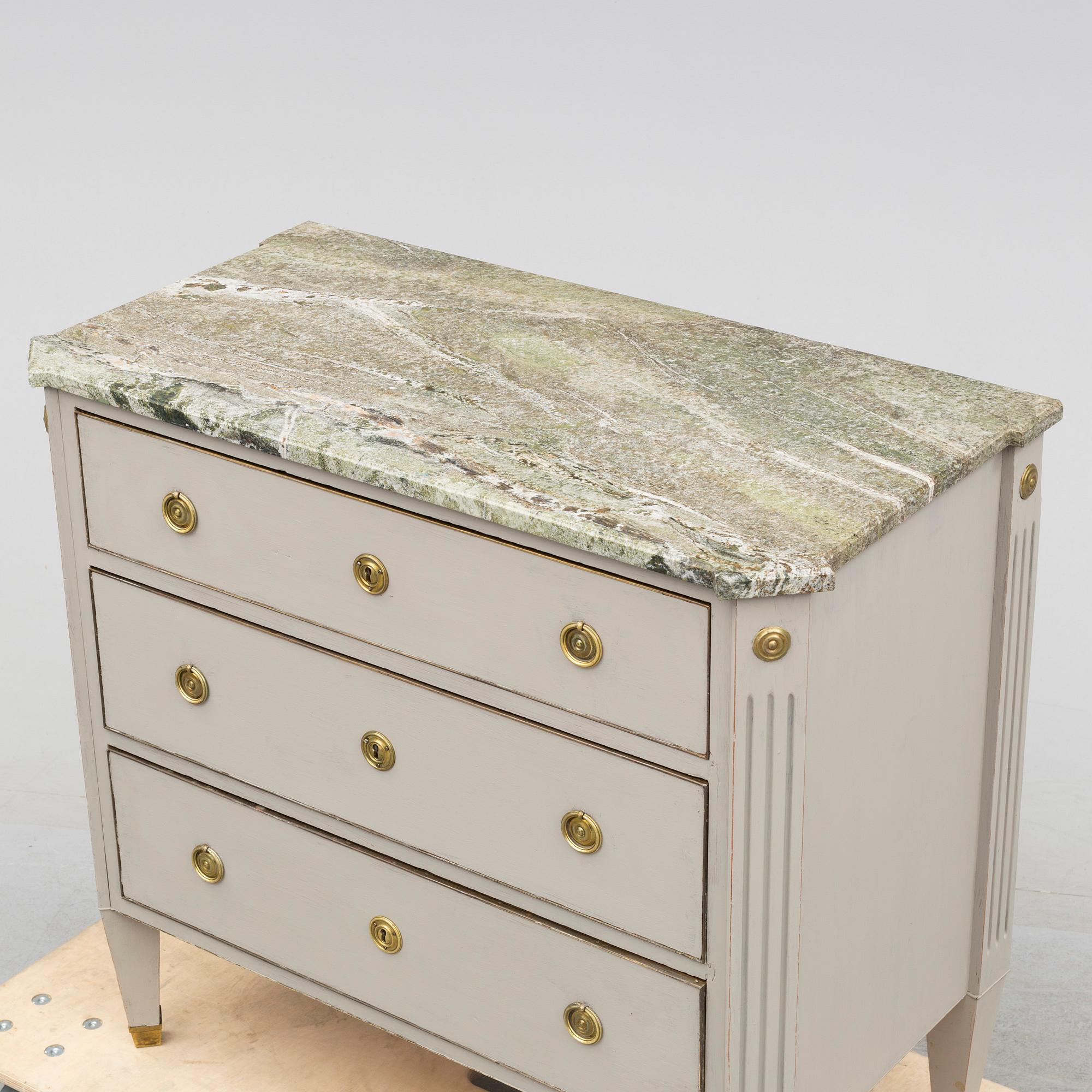 an early 20th century chest of drawers.