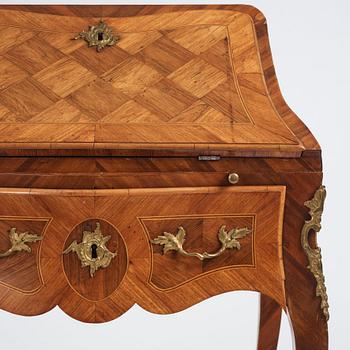 A rococo parquetry secretaire, Stockholm, later part of the 18th century.