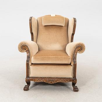 A fabric upholstered easy chair from the second half of the 20th Century.