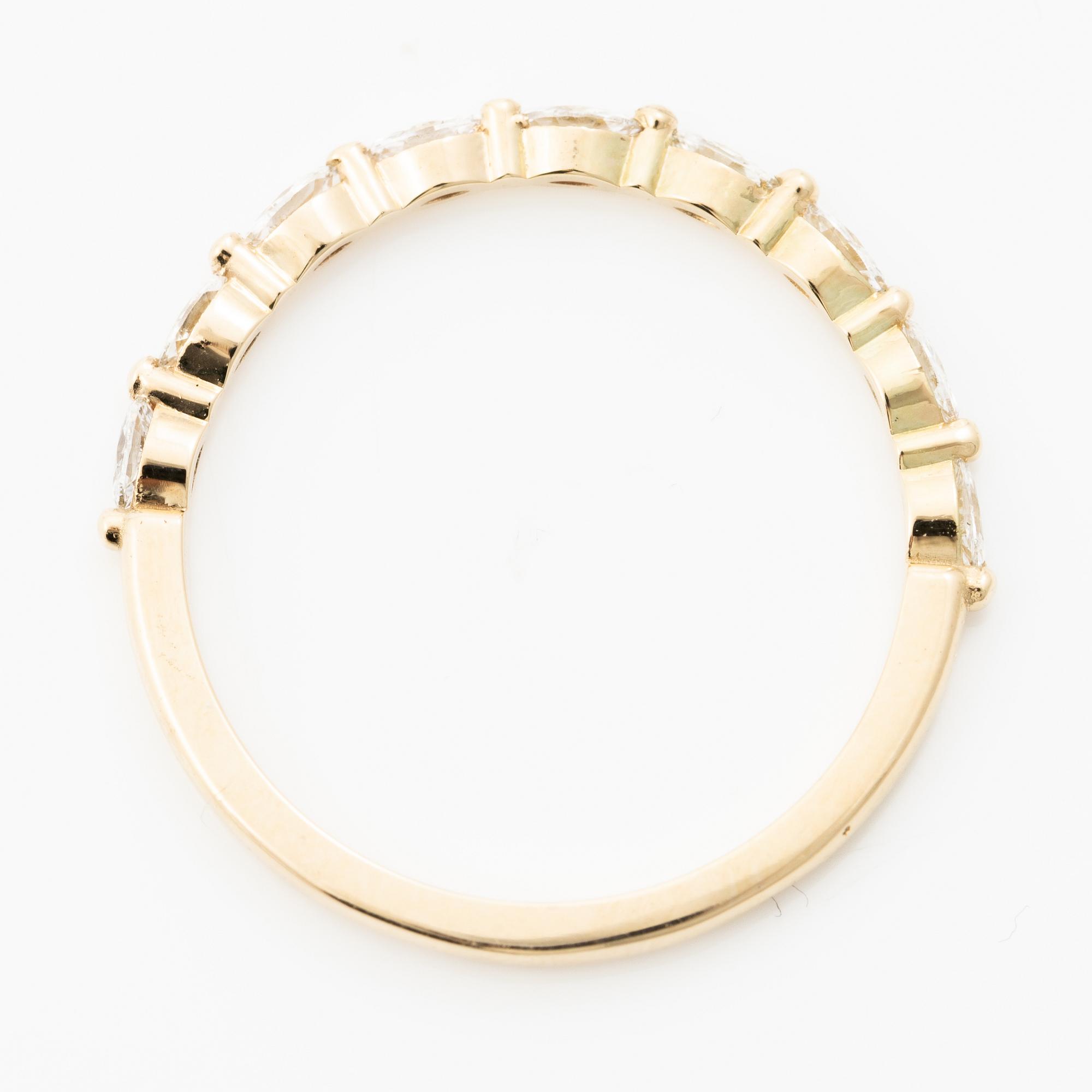 14K gold ring with marquise-cut diamonds.