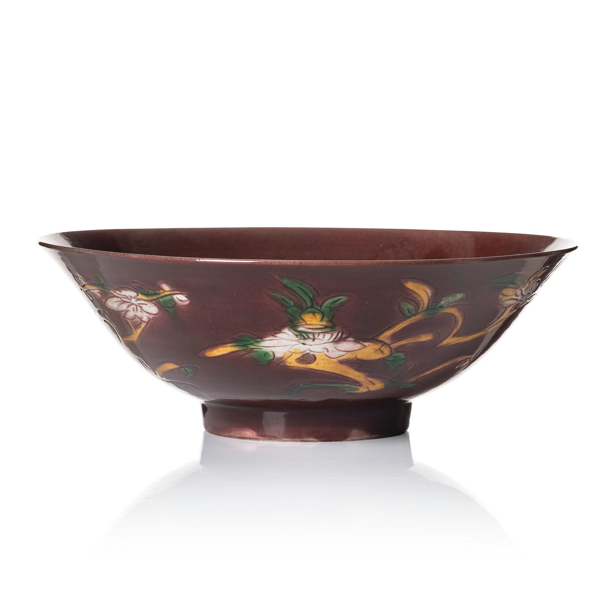 An aubergine glazed brinjal bowl, Qing dynasty, circa 1700.