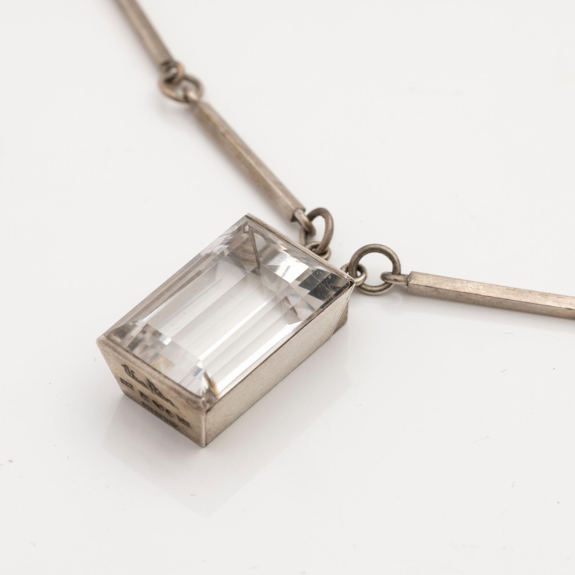 Wiwen Nilsson, Pendant, sterling silver with faceted rock crystal, Lund 1944.