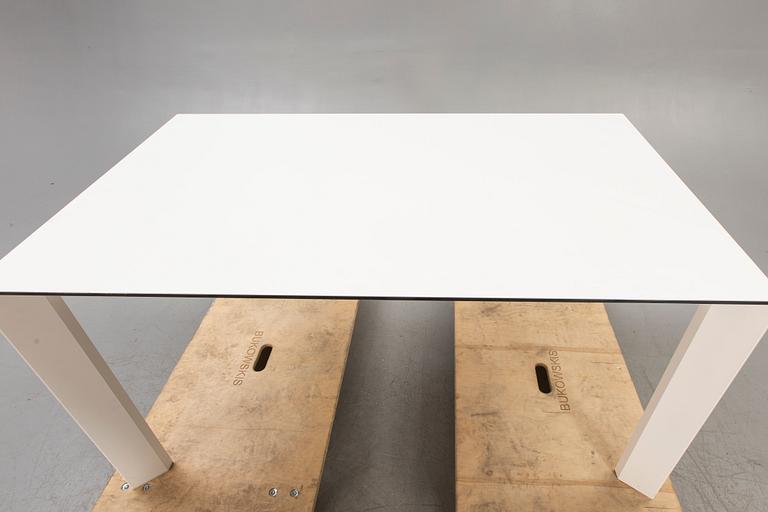 Caronni & Bonanomi, a "Every + Grid" dining table for Desalto 21st century.