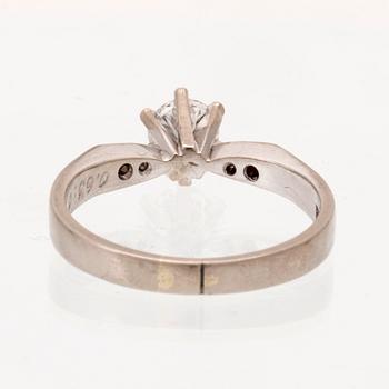 An 18K white gold ring set with round brilliant cut diamonds by Lundberg Guldatelje Amie Stockholm 1977.