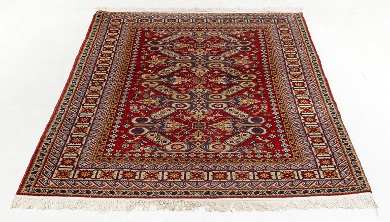 A rug, 215 x 130 cm.