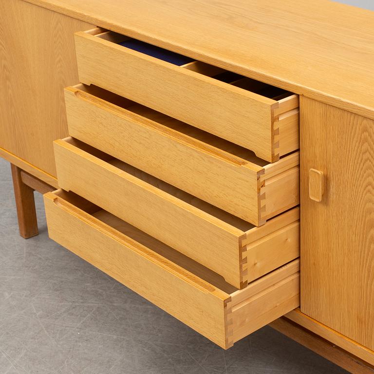 A second half of the 20th century oak veneered 'Arild' sideboard by Nils Jonsson, Troeds, Sweden.