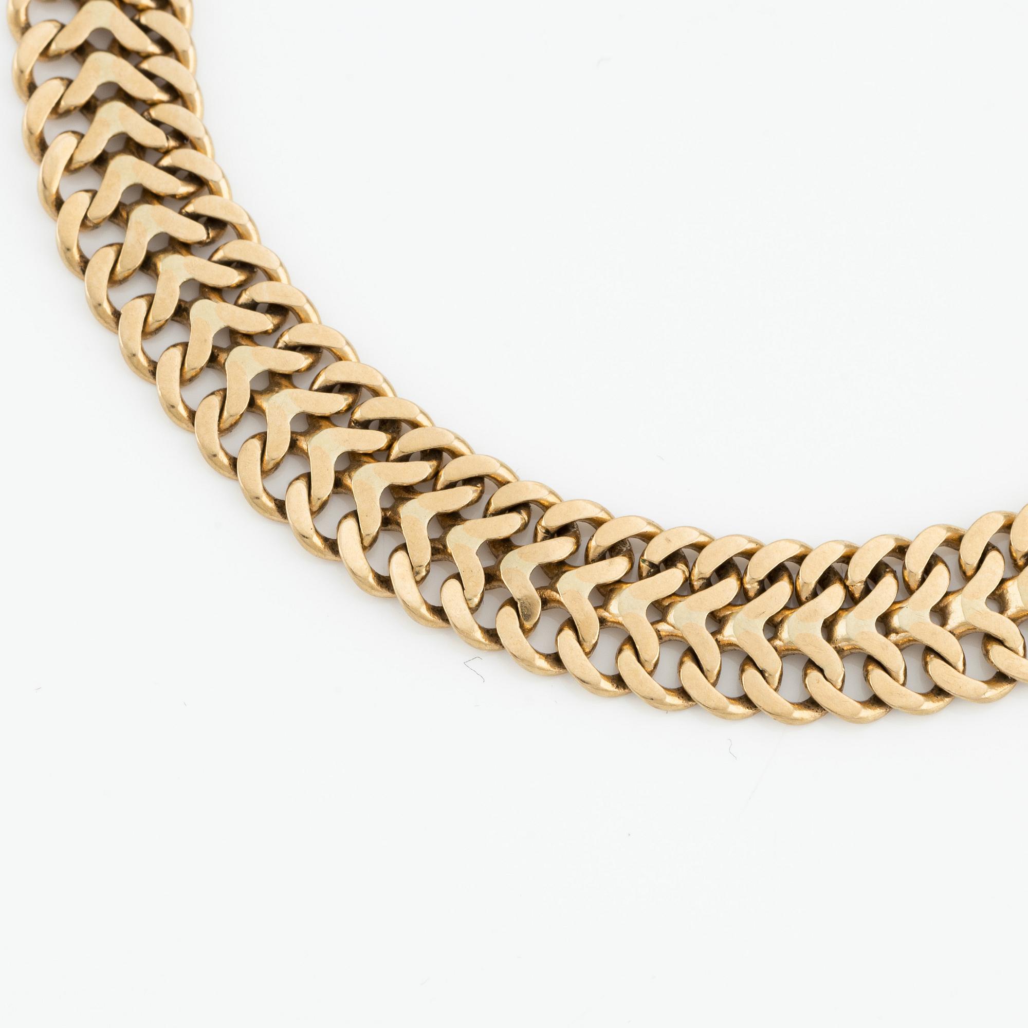 Armlänk, 18K guld, fiskbenslänk.