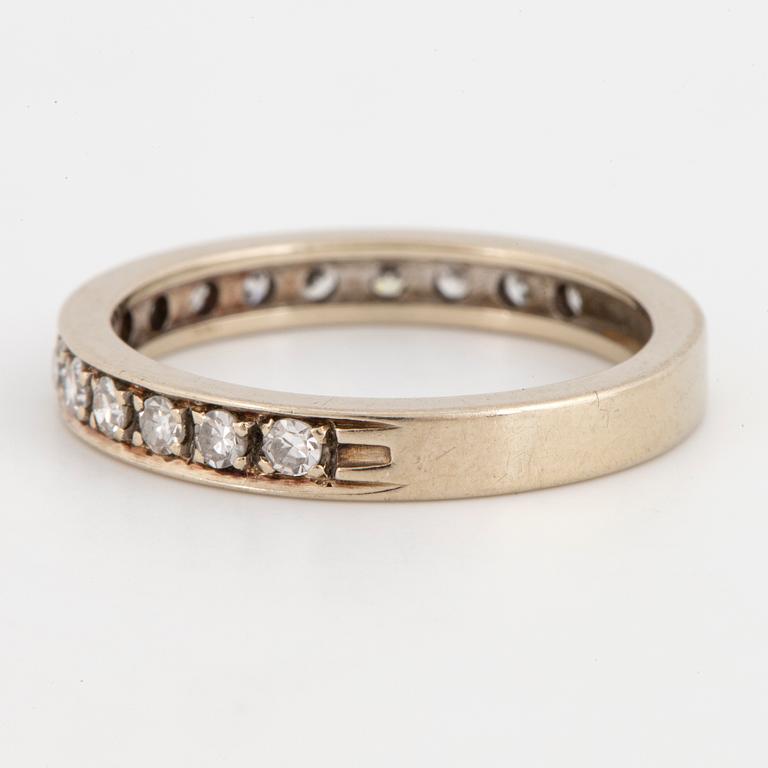 Half-eternity white gold with eight-cut diamond ring.