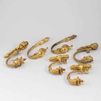 Six ormolu and bronze curtain tie-backs, (2 pairs), 19th century.