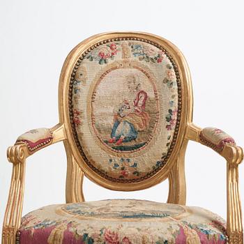 A set of four Louis XVI armchairs.