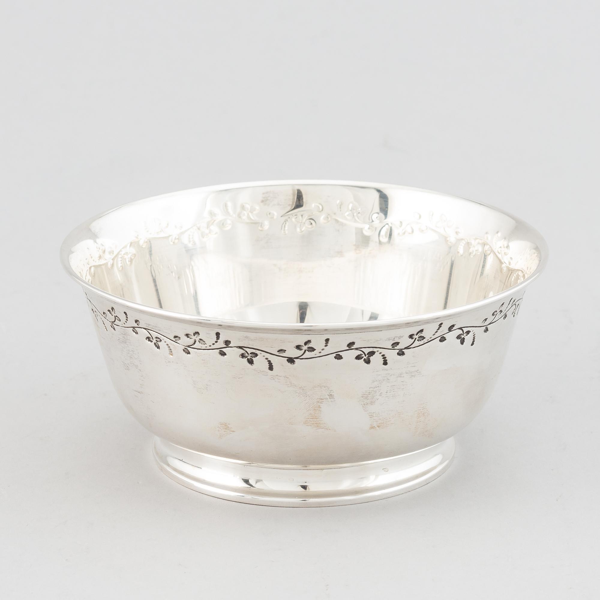 Tore Eldh, a silver bowl, decorated with a border of leafy sprigs, Gothengurg, Sweden, 1950.