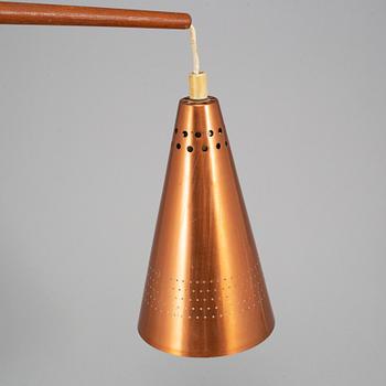 HANS-AGNE JAKOBSSON, a 1950's copper and teak wall-light model S-1718.
