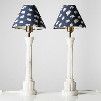 A pair of alabaster table lamps, 20th century.