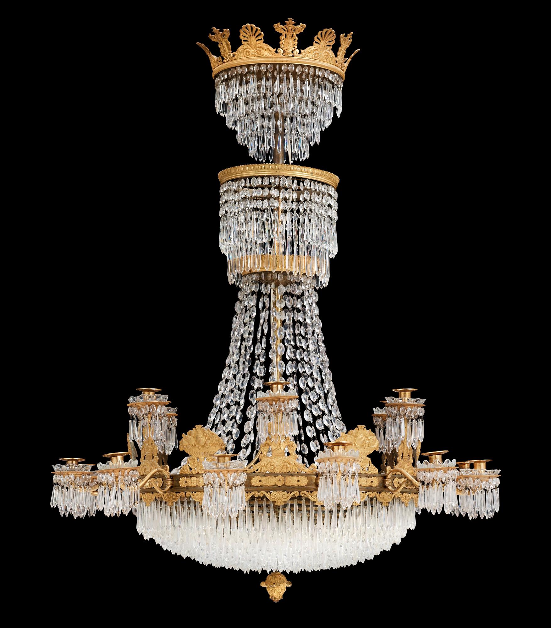 An Empire first half 19th century eighteen-light gilt bronze chandelier.