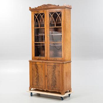 A vitrine cabinet, 19th century.