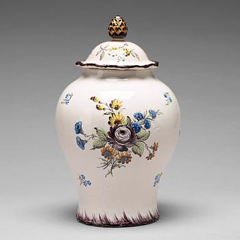 300. A Swedish Rörstrand faience jar with cover, 18th Century.