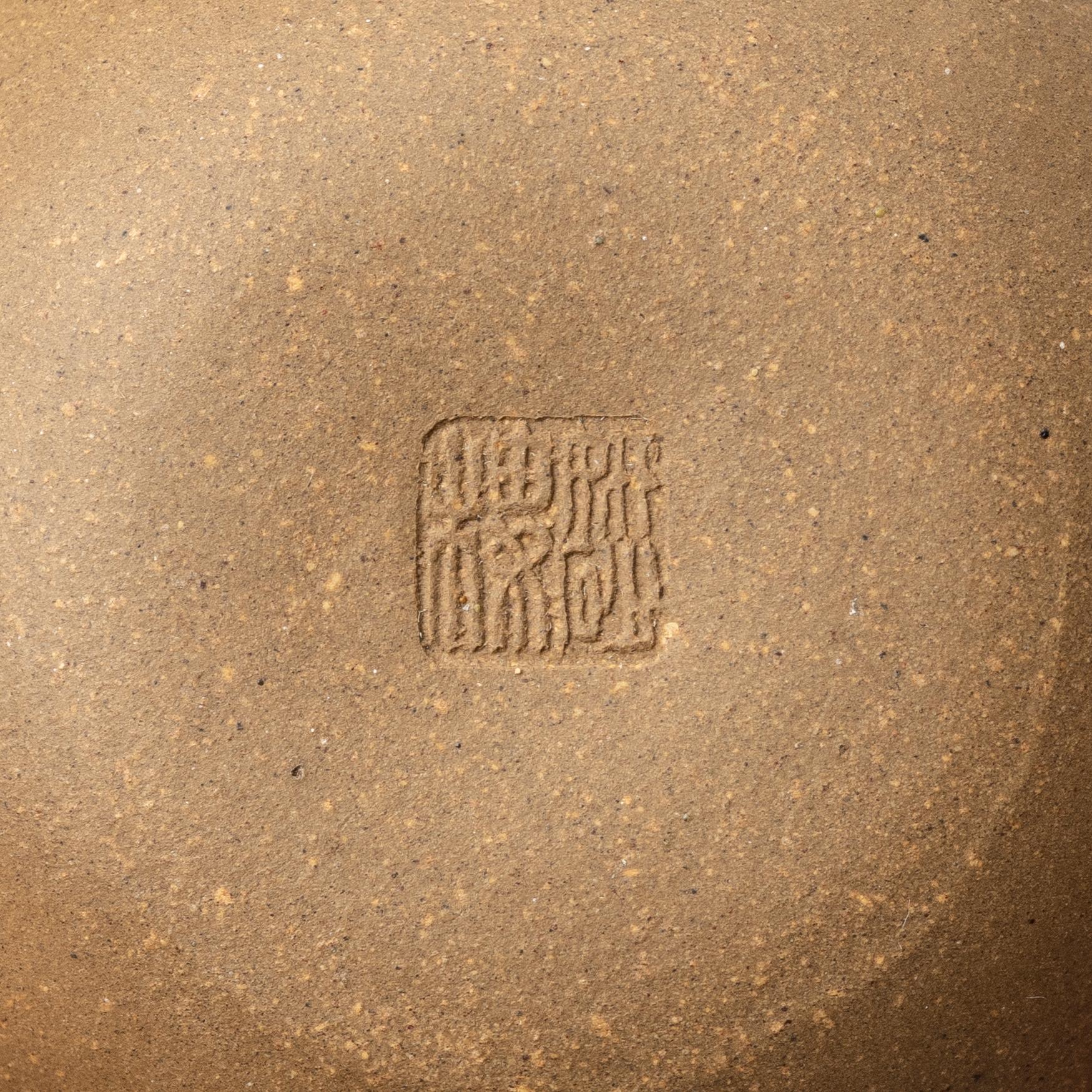 Two yellow yixing teapots, China, 1980/90s.