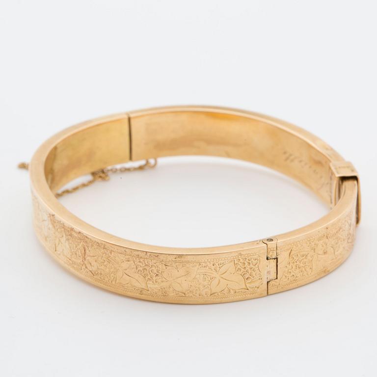 ARMBAND, 18K guld med berlock.