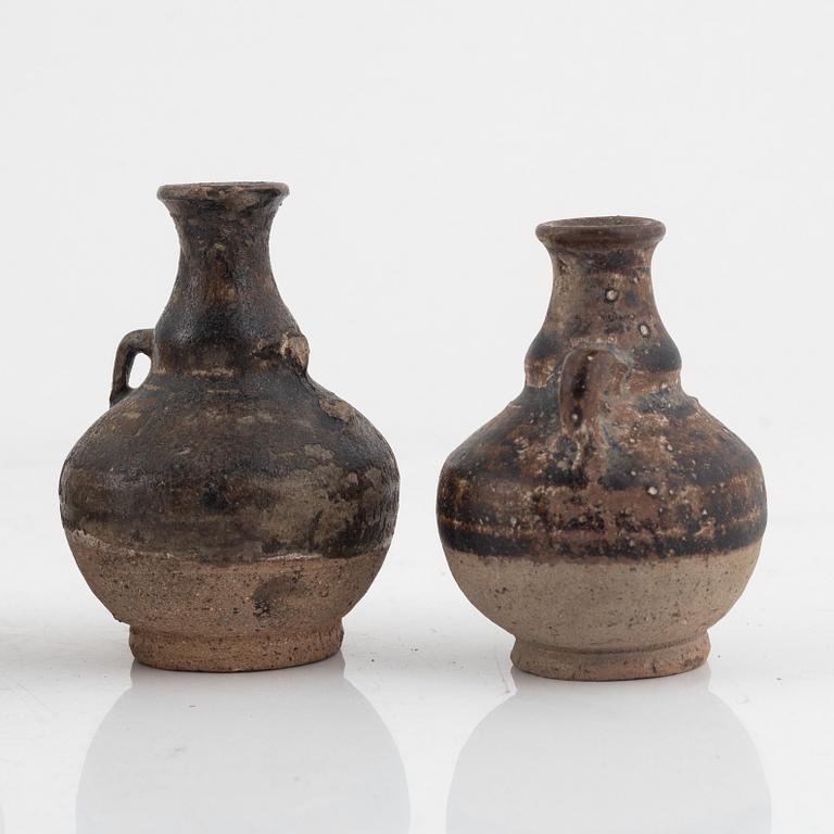 Two ceramic bowls and three small ewers, South east Asia, 16th century.