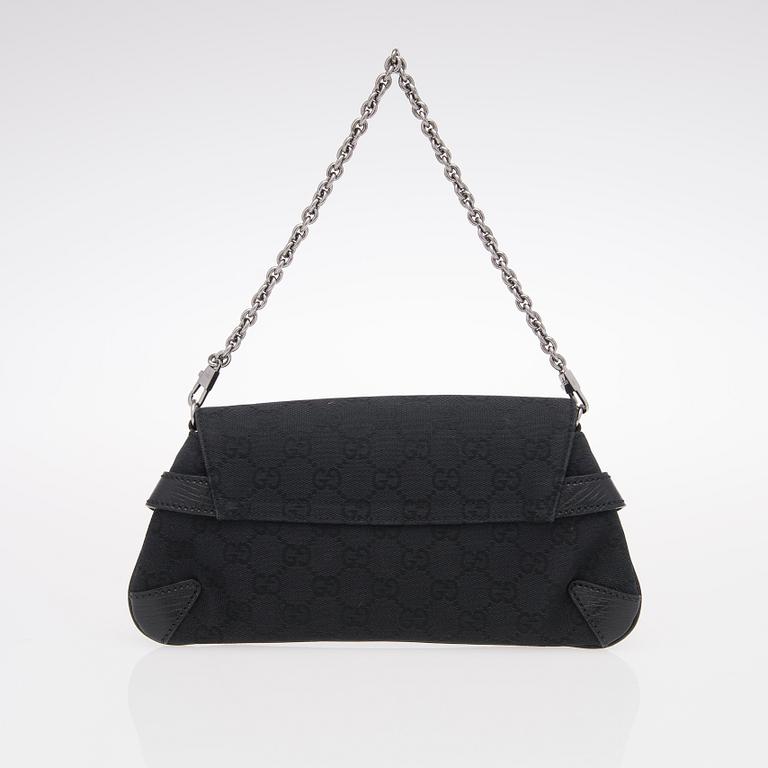 A Black GG Canvas Horsebit Clutch.