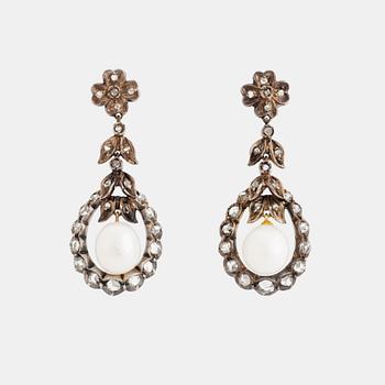 414. A pair of silver and gold earrings set with pearls and rose-cut diamonds.