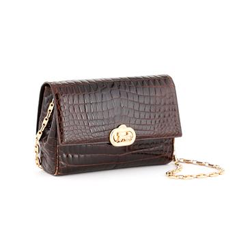 CÉLINE, a brown crocodile evening bag / shoulder bag with  shoulder strap.